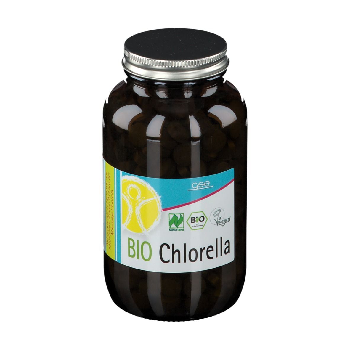 Flacon en verre brun avec comprimés noirs. Étiquette "BIO Chlorella", label bio et vegan. Bouchon noir.