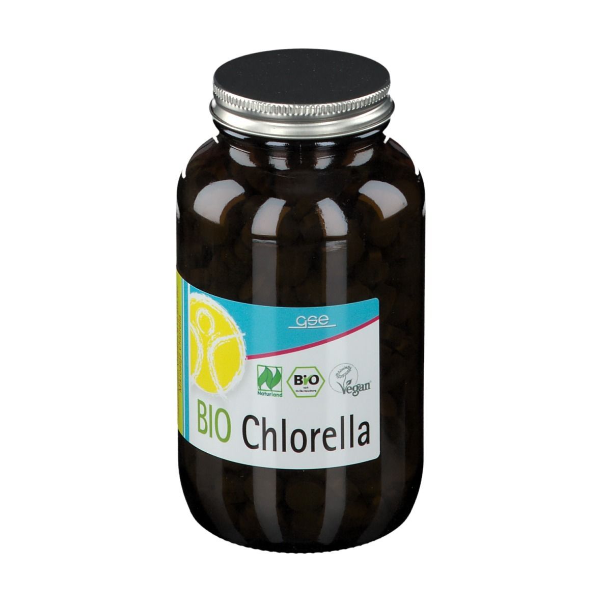 Flacon en verre brun avec comprimés noirs. Étiquette "BIO Chlorella", label bio et vegan. Bouchon noir.