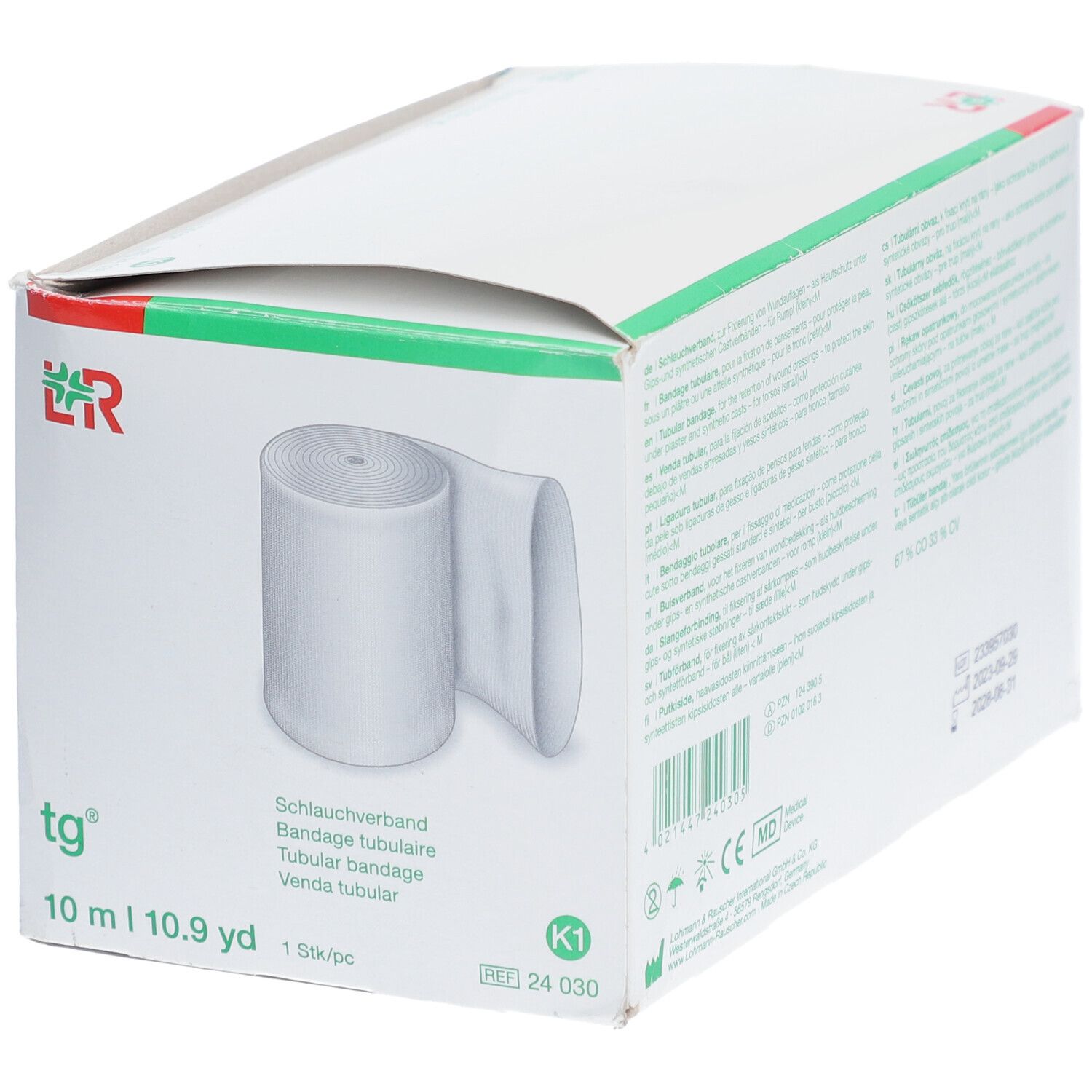 tg® Bandage tubulaire en emballage. Bande blanche, 10 m. Inscriptions : tg®, 10 m | 10.9 yd, K1.