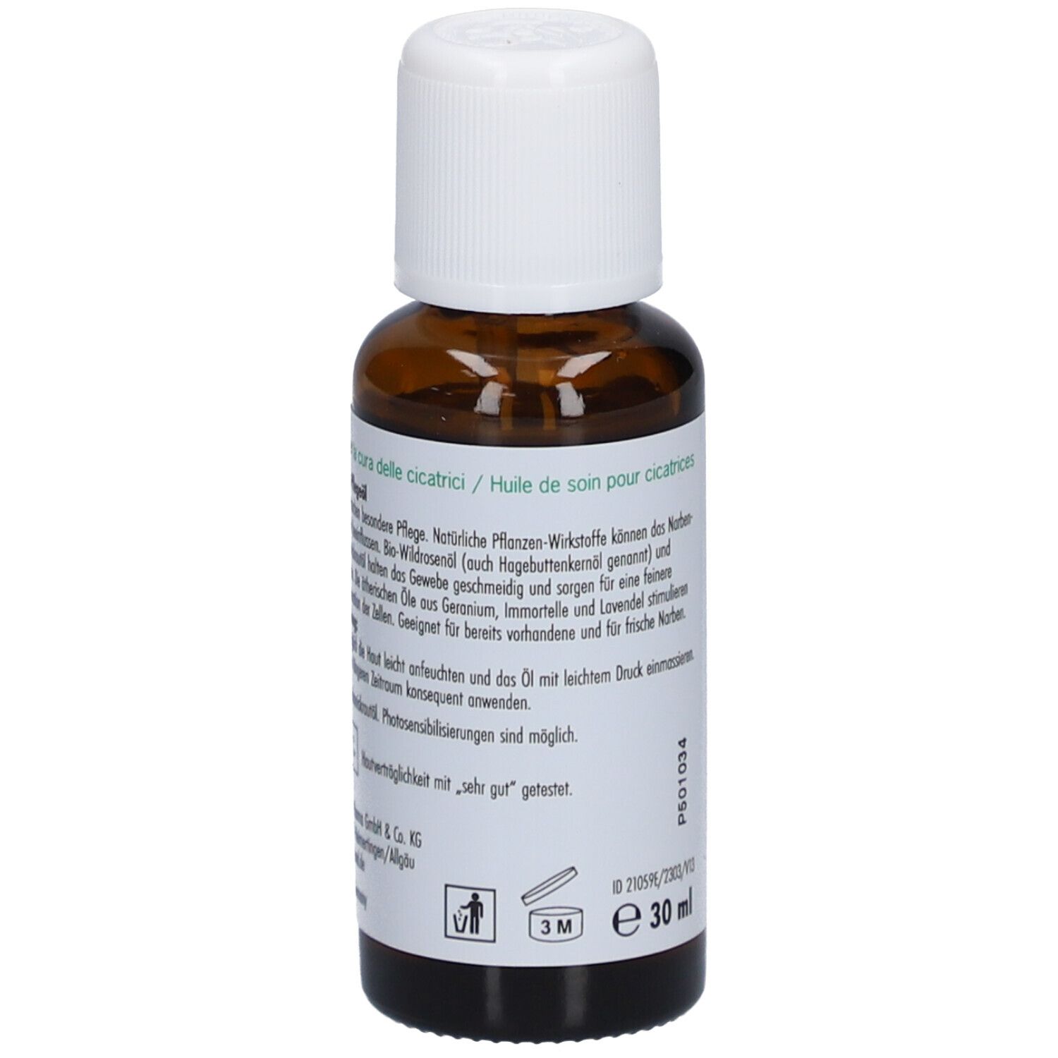 Dos du flacon en verre brun avec bouchon blanc. Texte en plusieurs langues. 30 ml. Cosmétiques naturels.