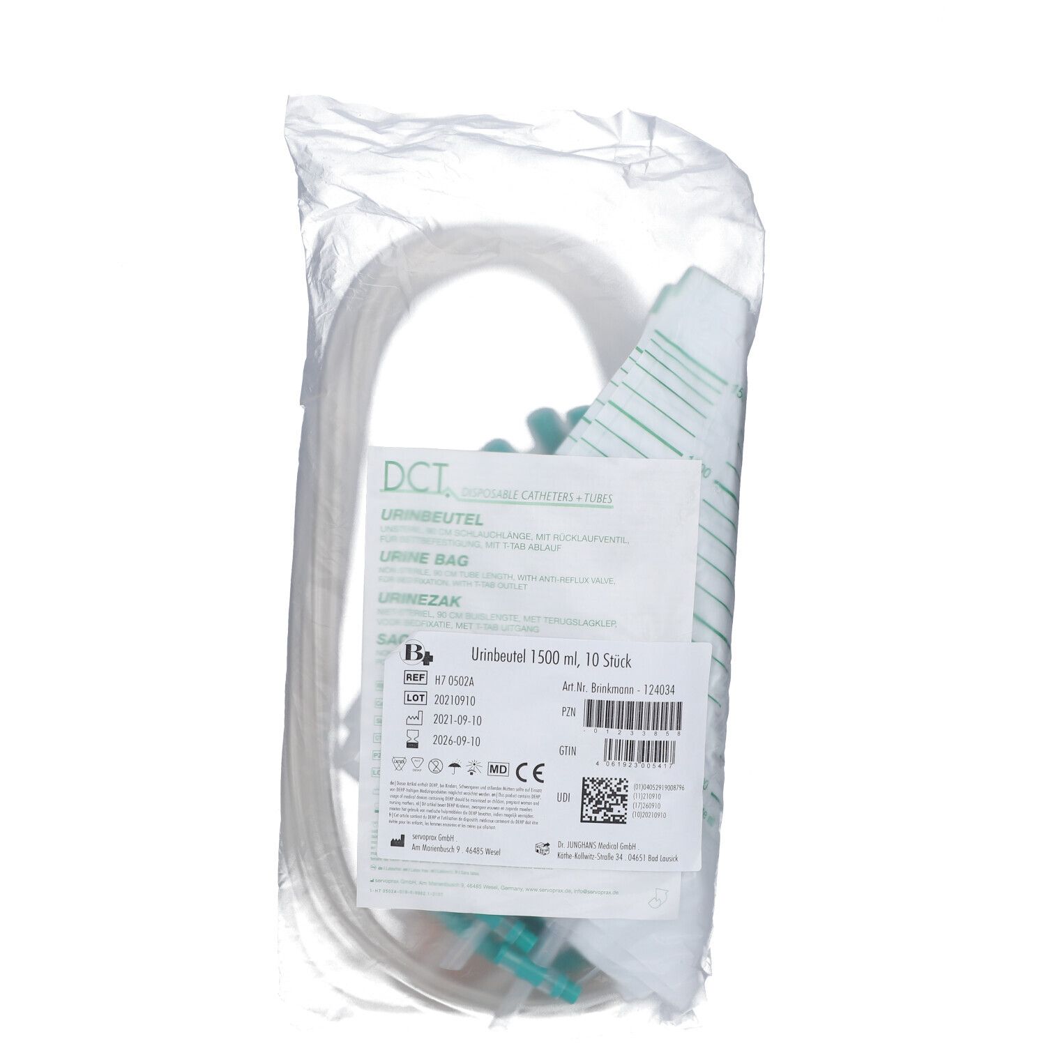 Ensemble de poche à urine en emballage plastique. Poche graduée, tube et connecteurs. Informations produit visibles.