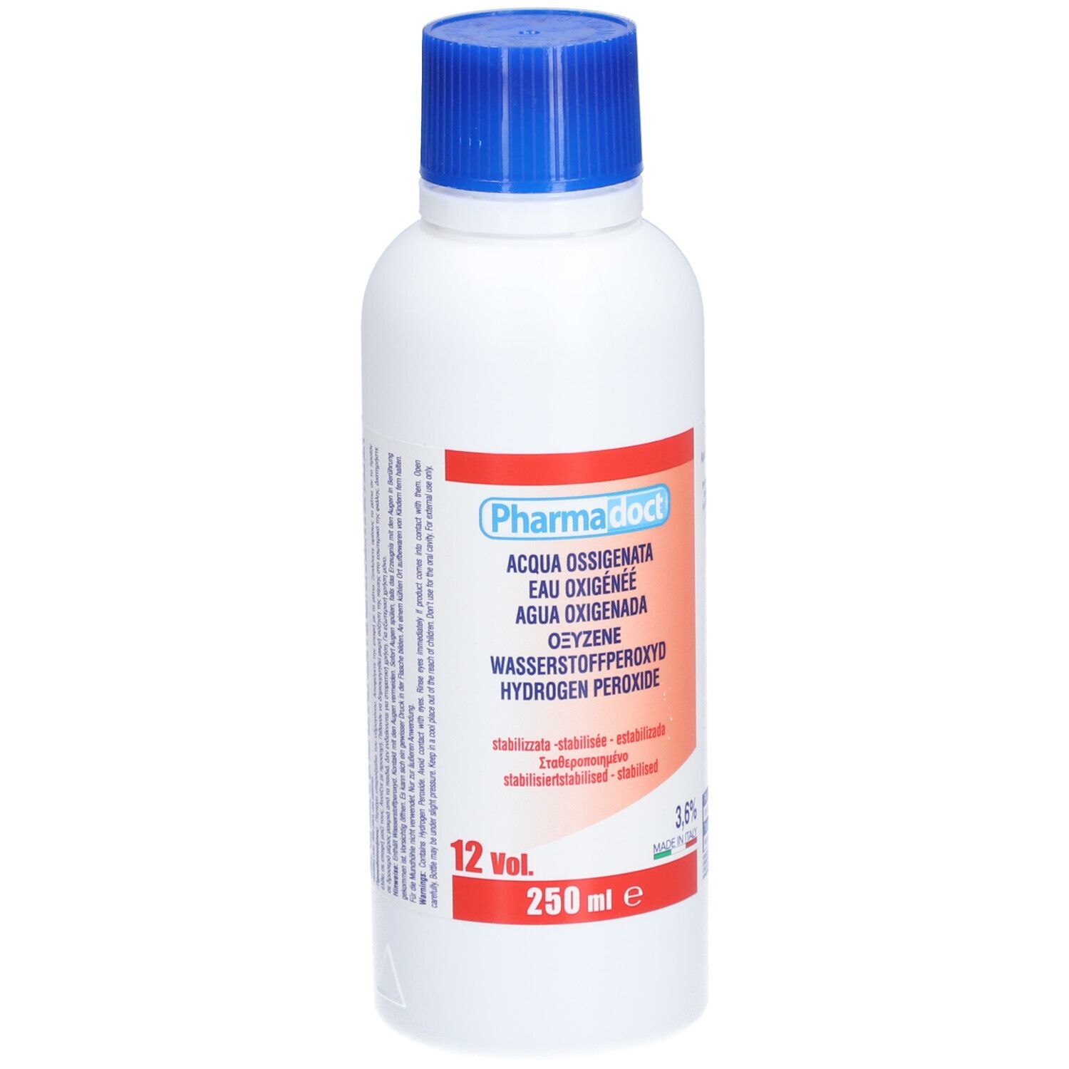 Flacon blanc à bouchon bleu. Étiquette rouge avec nom du produit et désignations multilingues. 250 ml.