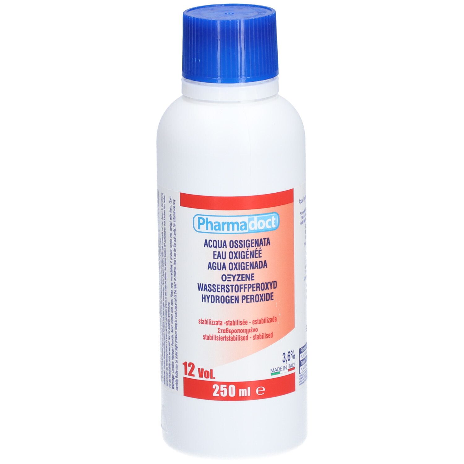 Flacon blanc à bouchon bleu. Étiquette rouge avec nom du produit et désignations multilingues. 250 ml.