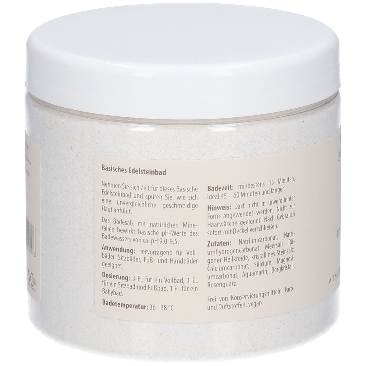 Dos du récipient rond blanc. Sections de texte avec informations sur le produit et les ingrédients.