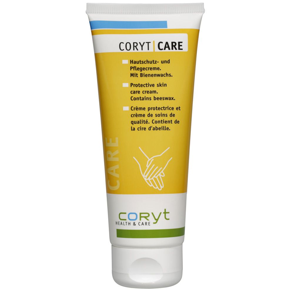Tube CORYT Care. Tube jaune avec texte bleu et vert. Contient de la cire d'abeille. Symbole des mains.