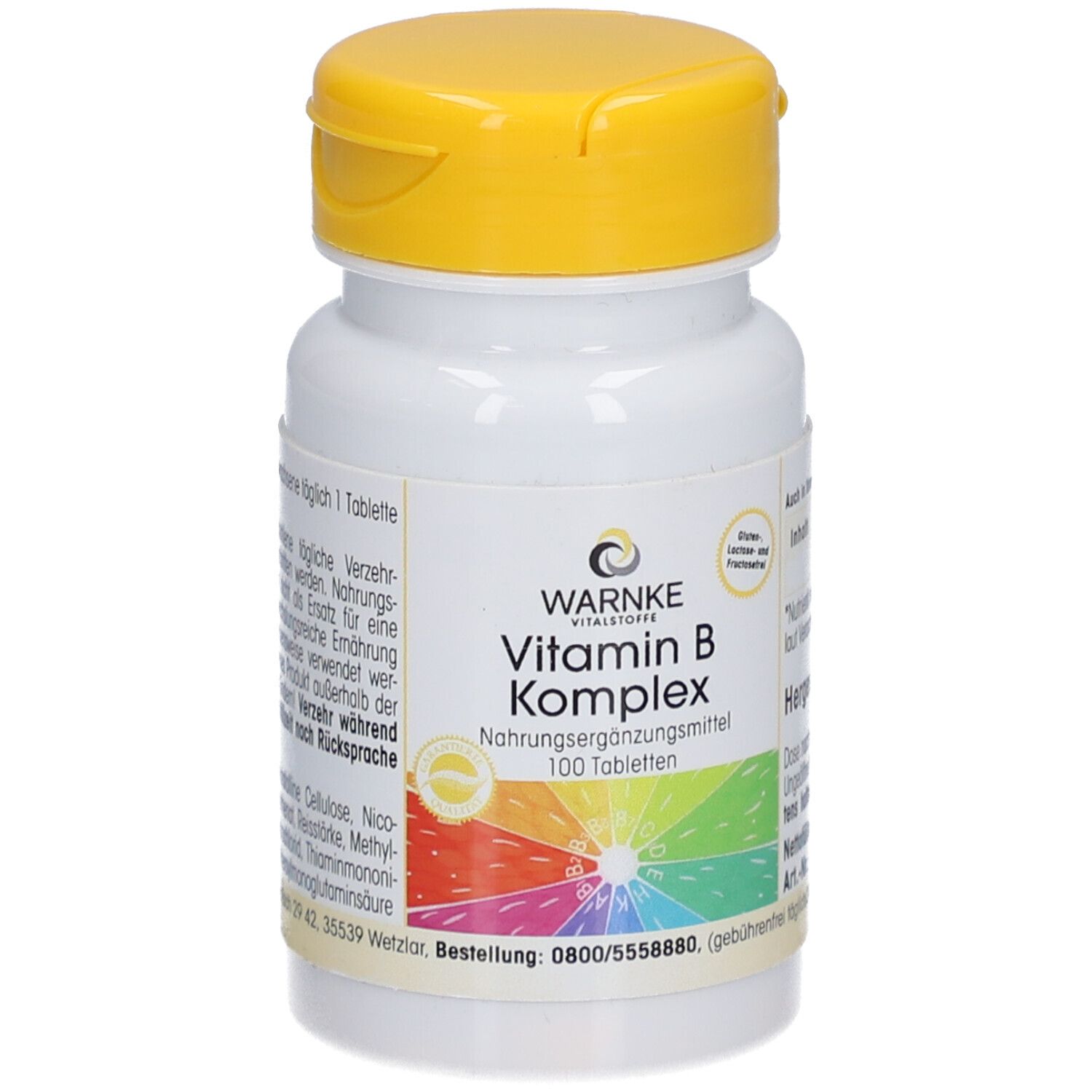 Flacon de comprimés blanc avec couvercle jaune. Inscription : WARNKE Vitamin B Komplex. 100 comprimés. Fond coloré.