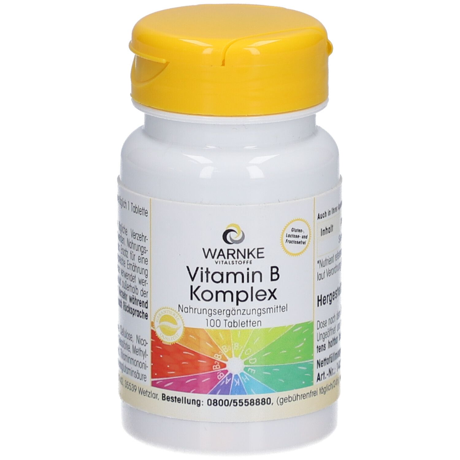 Flacon de comprimés blanc avec couvercle jaune. Inscription : WARNKE Vitamin B Komplex. 100 comprimés. Fond coloré.