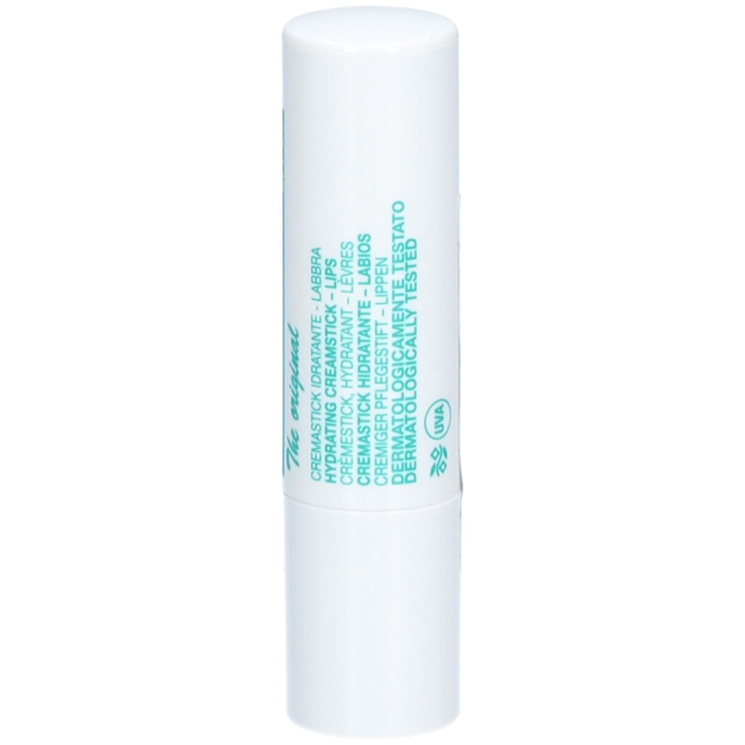 Stick à lèvres blanc avec texte vert. Inscription: Crème, testé dermatologiquement.