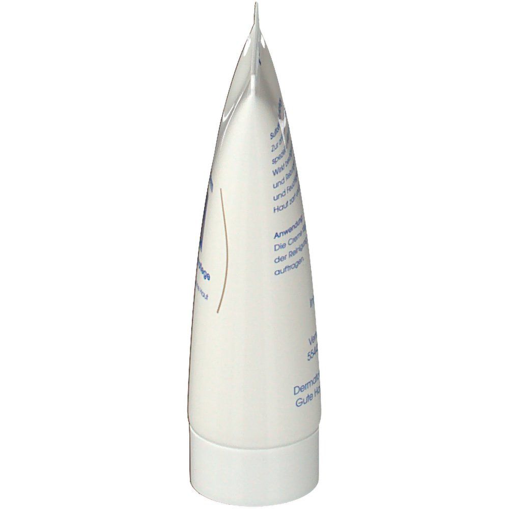 Vue latérale d'un tube blanc. Pointu en haut, avec texte. Bouchon à vis blanc en bas.