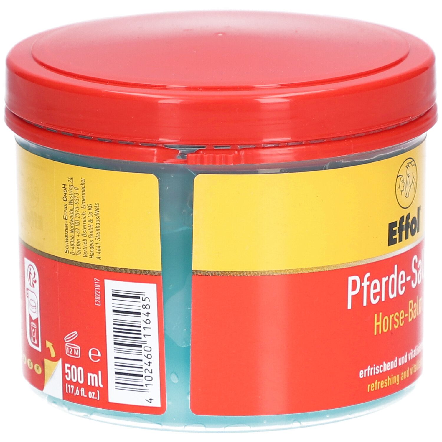 Pot rond avec couvercle rouge et étiquette jaune et rouge. Inscription : Effol Pferde-Salbe, Horse-Balm. Contient 500 ml. Produit avec contenu bleuté.