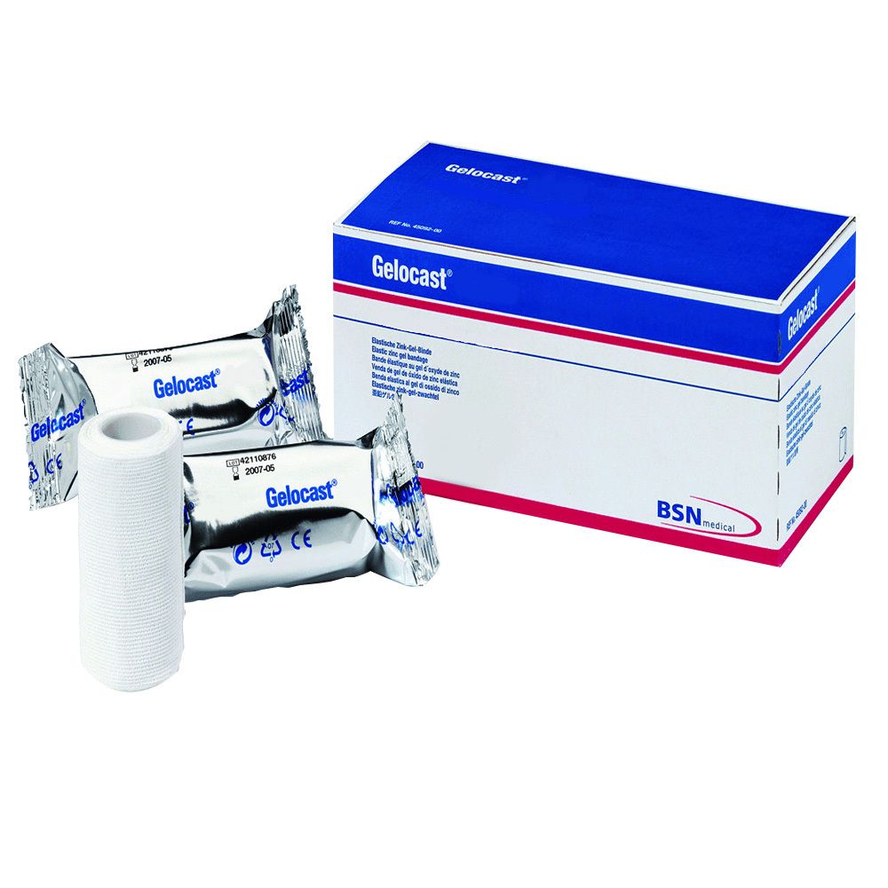 Rouleau de bandage et emballage. Nom et marque du produit visibles. Emballage avec partie supérieure bleue et inférieure blanche.