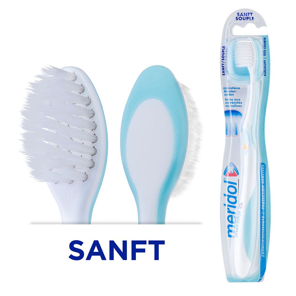 Brosse à dents bleue et blanche. Inscription : SANFT. Marque meridol.