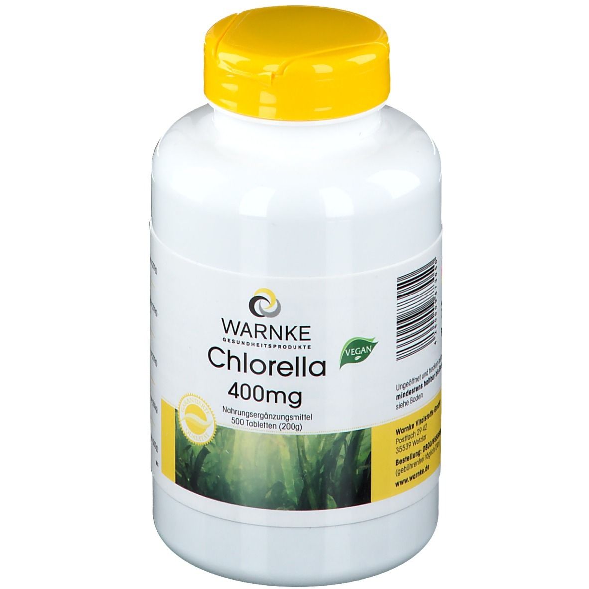 Flacon blanc à bouchon jaune. Inscription: WARNKE Chlorella 400mg. Label Vegan. 500 comprimés.