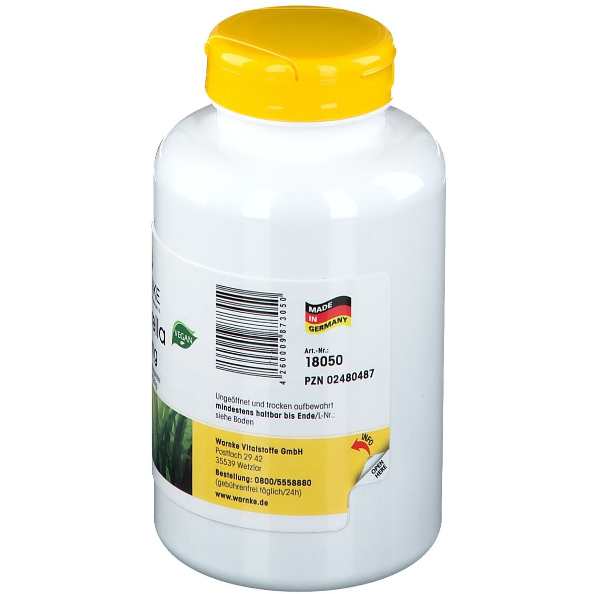 Dos du flacon blanc à bouchon jaune. Inscription: WARNKE. Fabriqué en Allemagne. Label Vegan. Numéro d'article.