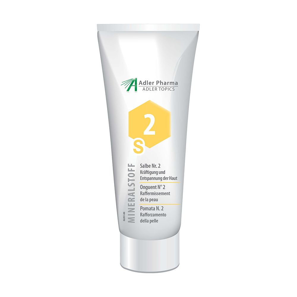 Tube blanc avec accent jaune. Inscription MINERALSTOFF, Salbe Nr. 2, logo Adler Pharma. Nom du produit en allemand, français, italien.