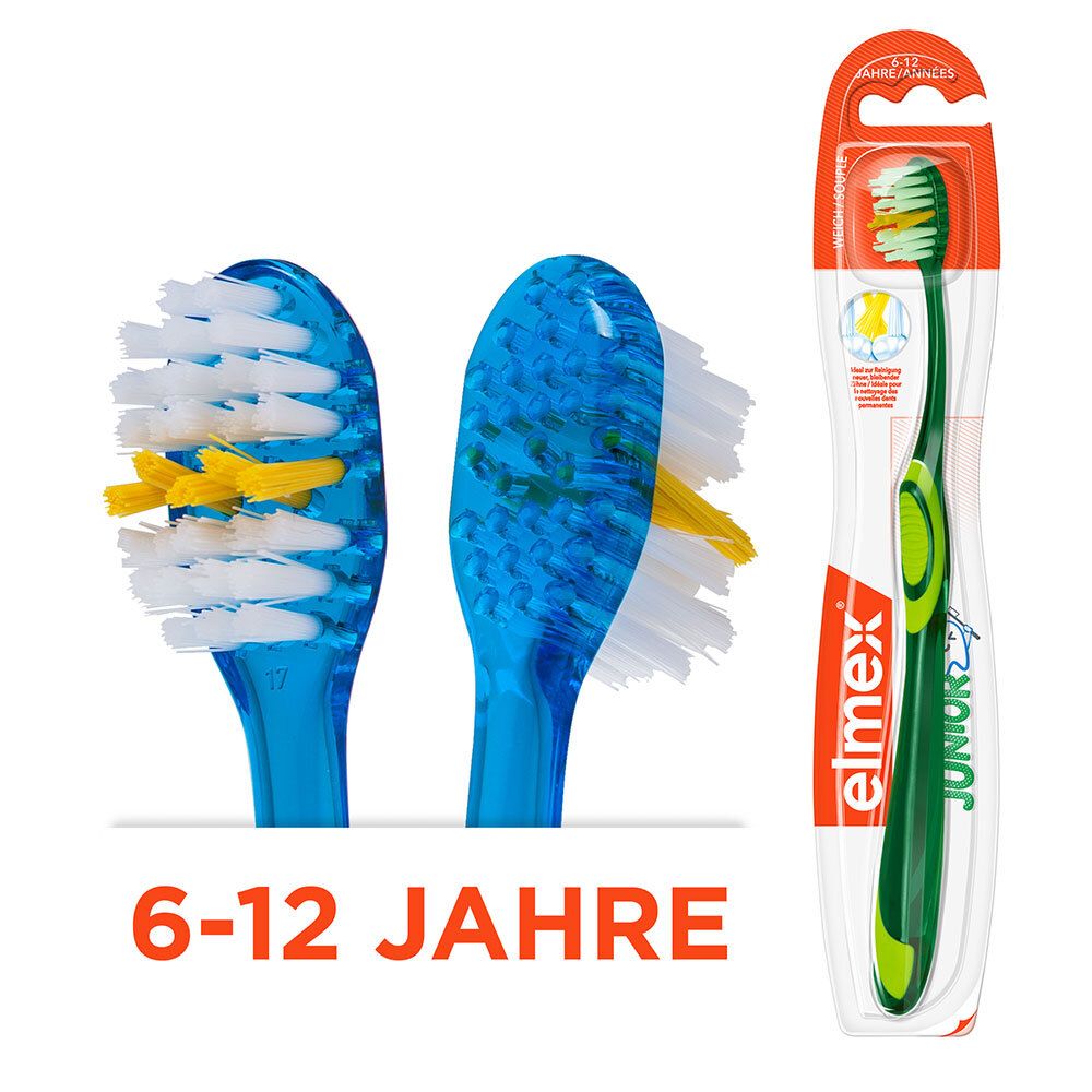 Brosse à dents verte et bleue, emballée dans du plastique transparent. Inscription : elmex Junior, 6-12 ans. Vue rapprochée des brins.