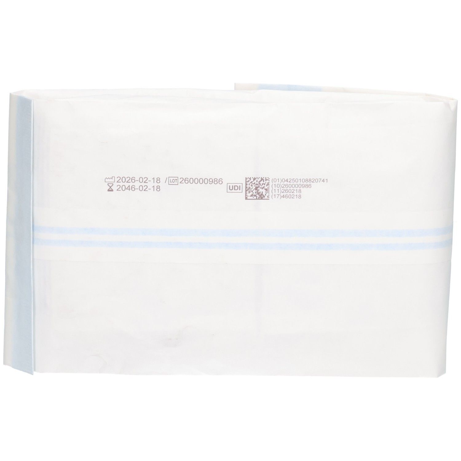Sachet stérile ouvert avec des bandes bleues. Texte et pictogrammes sur l'emballage.