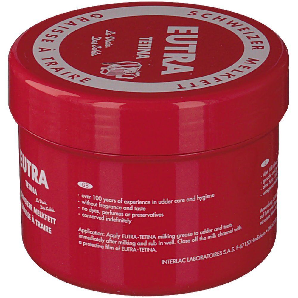 Pot rouge avec couvercle blanc. Inscription : Eutra Tetina, Melkfett suisse, Graisse à Traire. Texte en anglais.