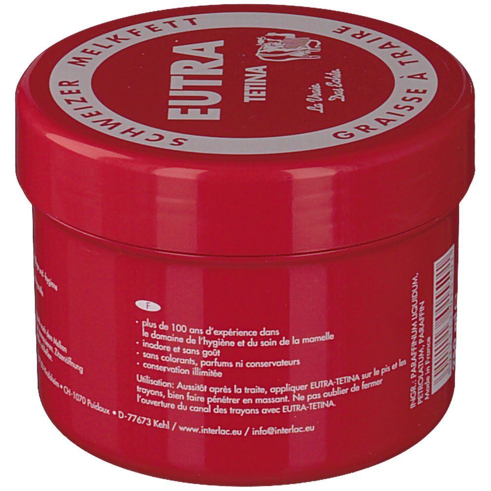 Pot rouge avec couvercle blanc. Inscription : Eutra Tetina, Melkfett suisse, Graisse à Traire. Texte en français.
