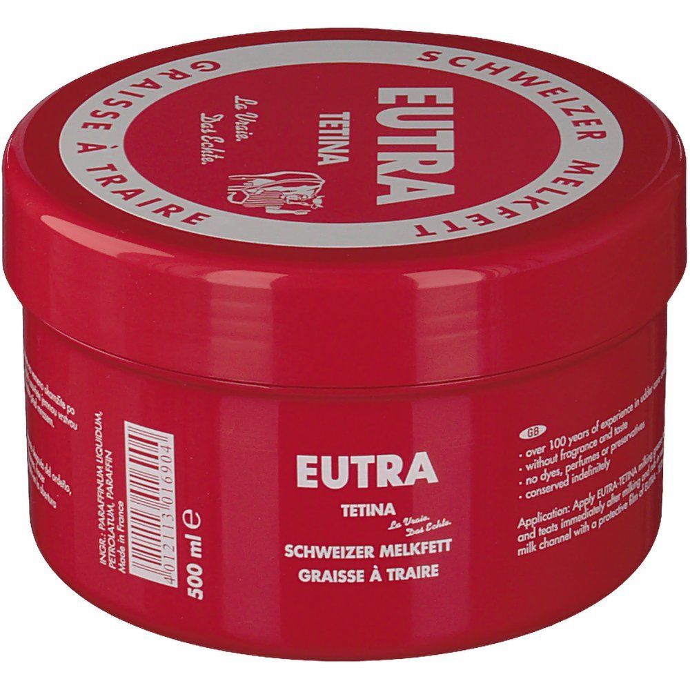 Pot rouge avec couvercle blanc. Inscription: Eutra Tetina, Schweizer Melkfett, Graisse à Traire. 500 ml. Texte: Sans parfum, colorants, conservateurs.