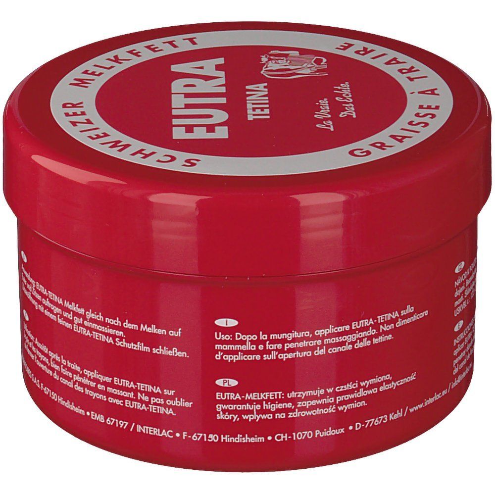 Pot rouge avec couvercle blanc. Inscription: Eutra Tetina, Schweizer Melkfett, Graisse à Traire. Instructions d'utilisation en allemand et italien.