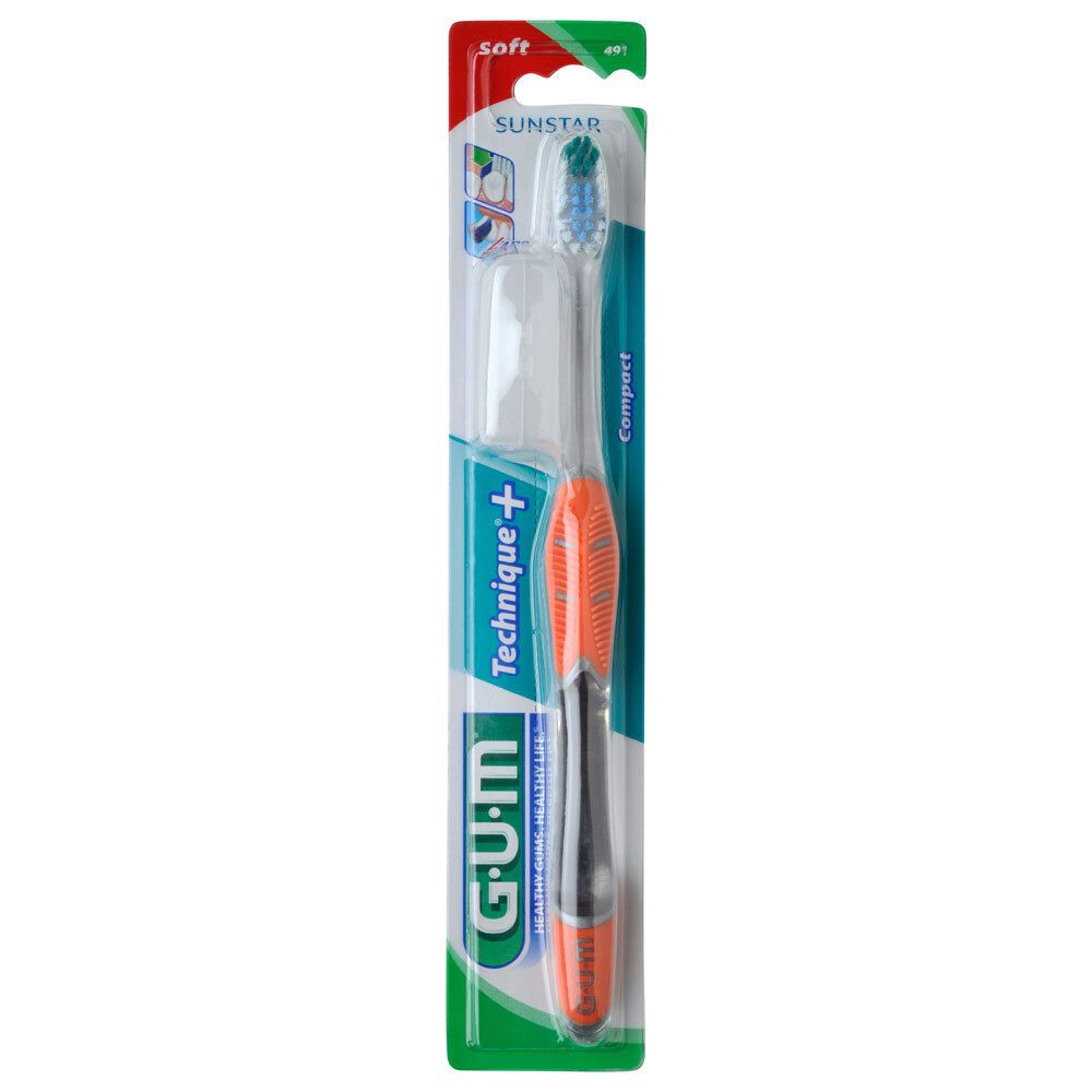 Brosse à dents G.U.M. Technique+ compact soft, emballage blister. Manche orange, tête bleue. Logo SUNSTAR.