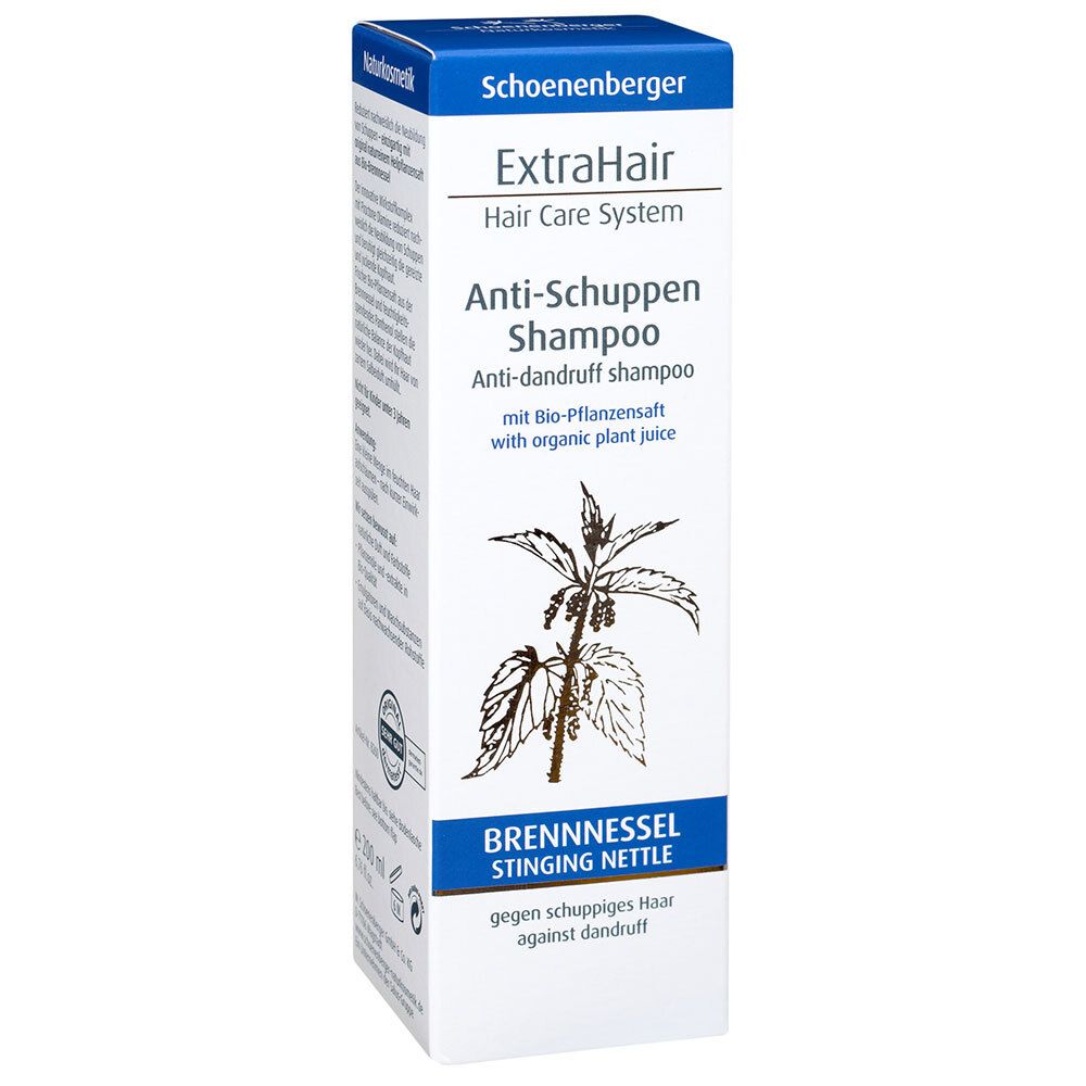 Boîte de shampooing. Inscription : ExtraHair Anti-Schuppen Shampoo. Illustration d'ortie et texte.