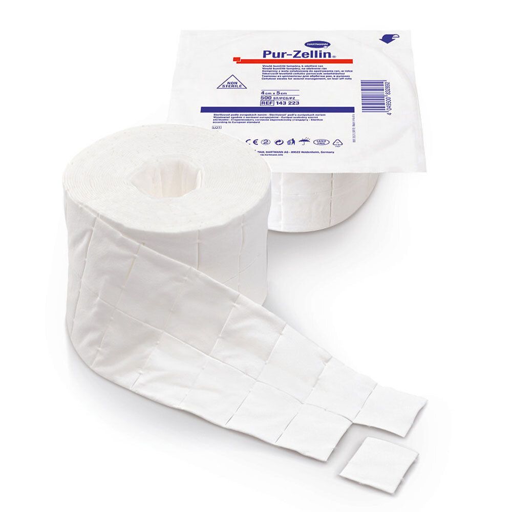 Rouleau de tampons de cellulose non stériles. Emballage avec informations produit. Tampons individuels détachés.