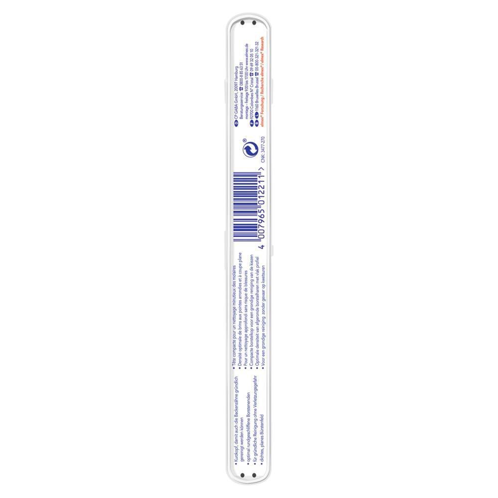Dos de l'emballage de la brosse à dents. Code-barres et texte multilingue. Marque elmex.