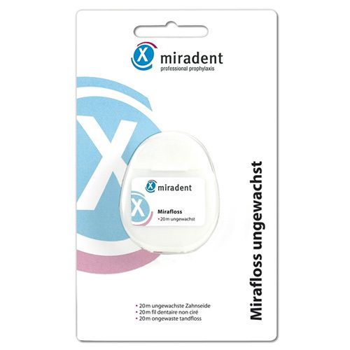 Distributeur de fil dentaire dans son emballage. Boîtier blanc avec nom et logo du produit. Inscription : 'Mirafloss 20 m non ciré'.