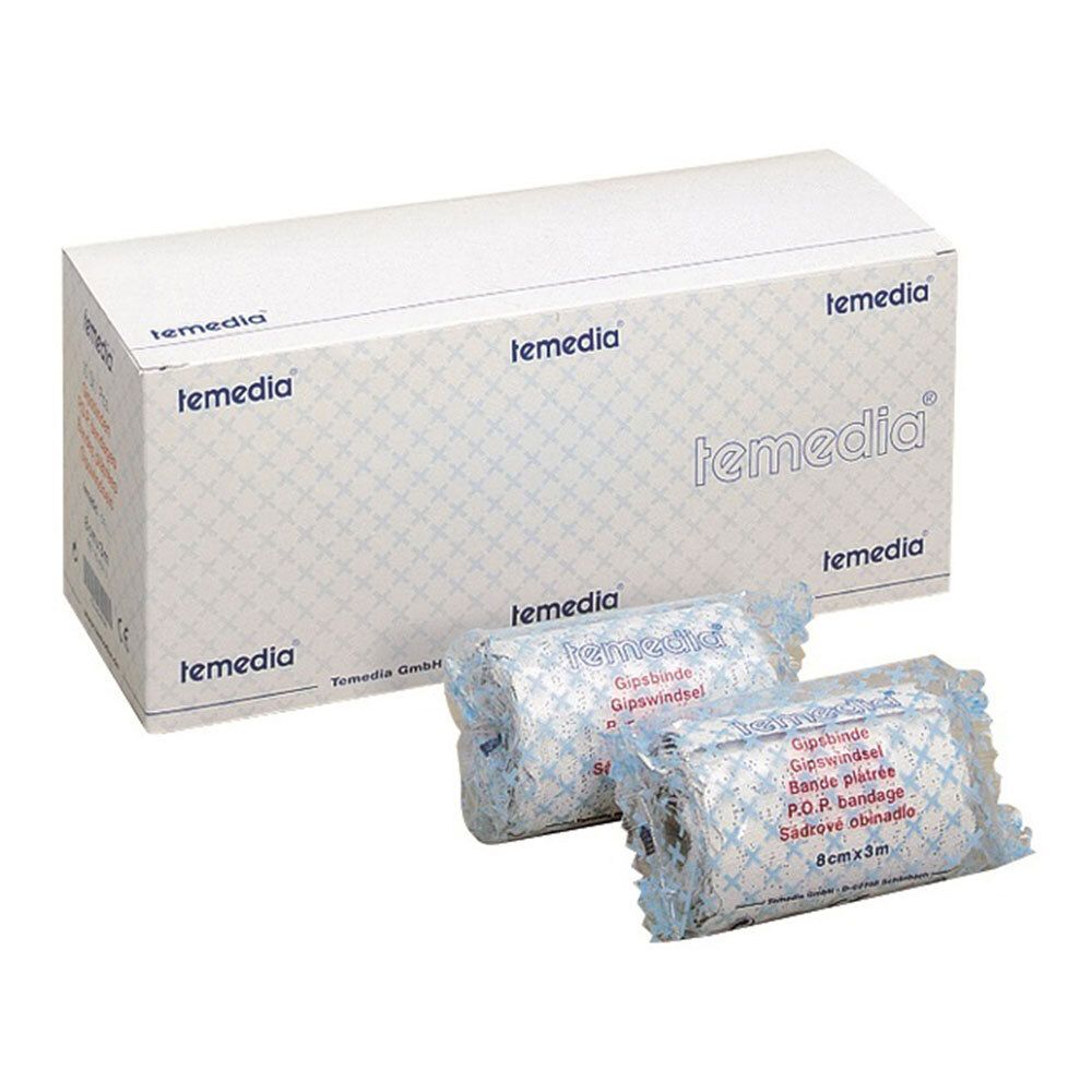 Emballage de bandages plâtrés. Deux rouleaux emballés, à côté d'une boîte avec le texte "temedia". Les rouleaux indiquent "Gipsbinde".