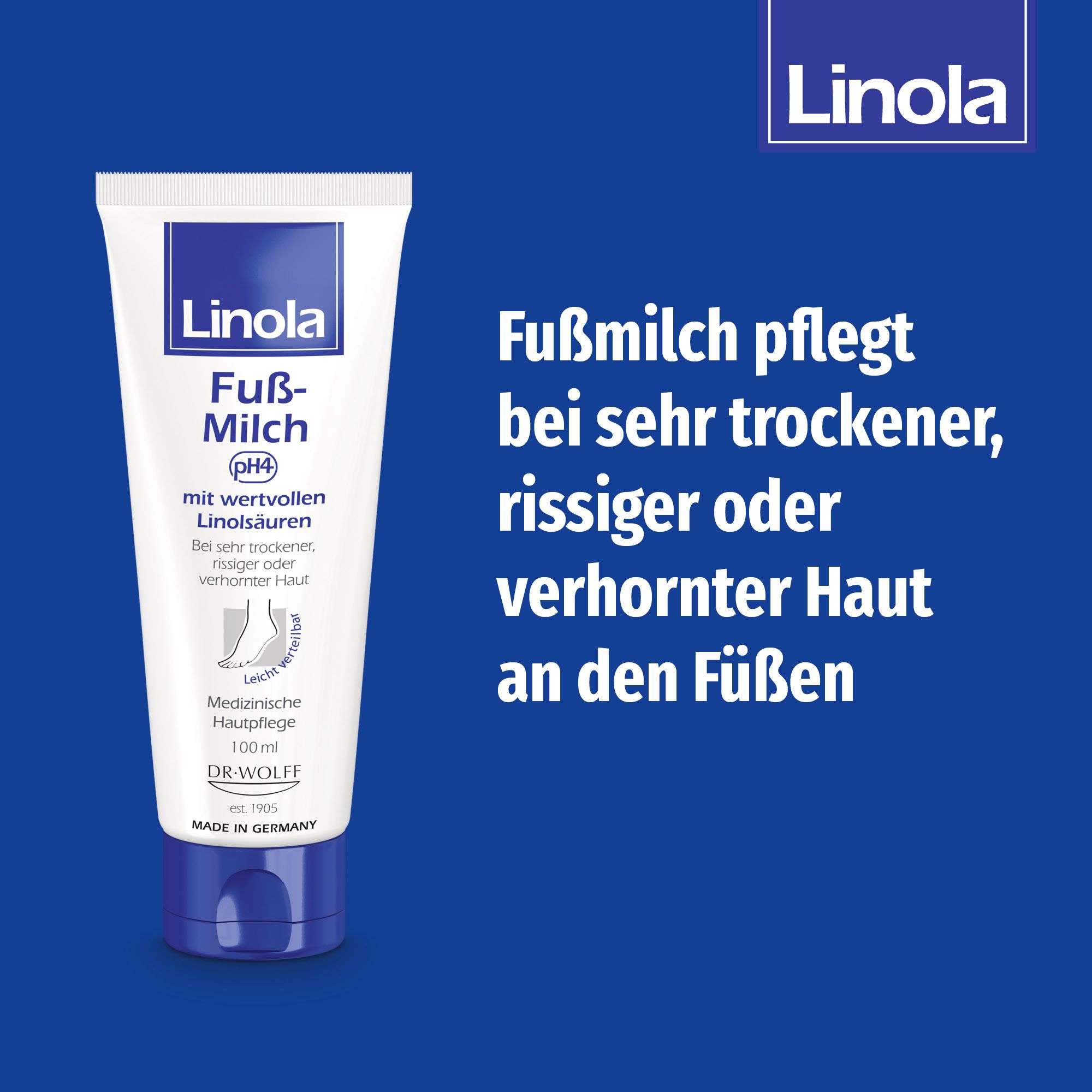Tube de Linola Fuß-Milch sur fond bleu. Soigne la peau sèche, craquelée ou cornée des pieds.