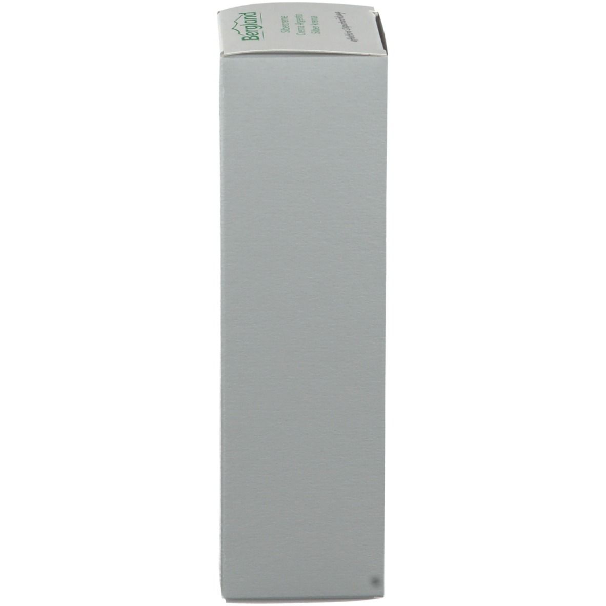 Emballage du produit, vue latérale. Surface grise unie. Logo en haut.