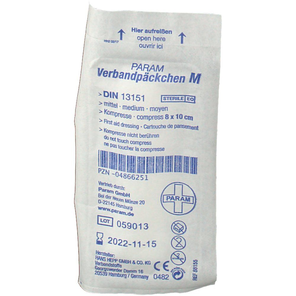 Emballage avec informations produit. Texte: PARAM Verbandpäckchen M, compresse 8 x 10 cm, DIN 13151, stérile.
