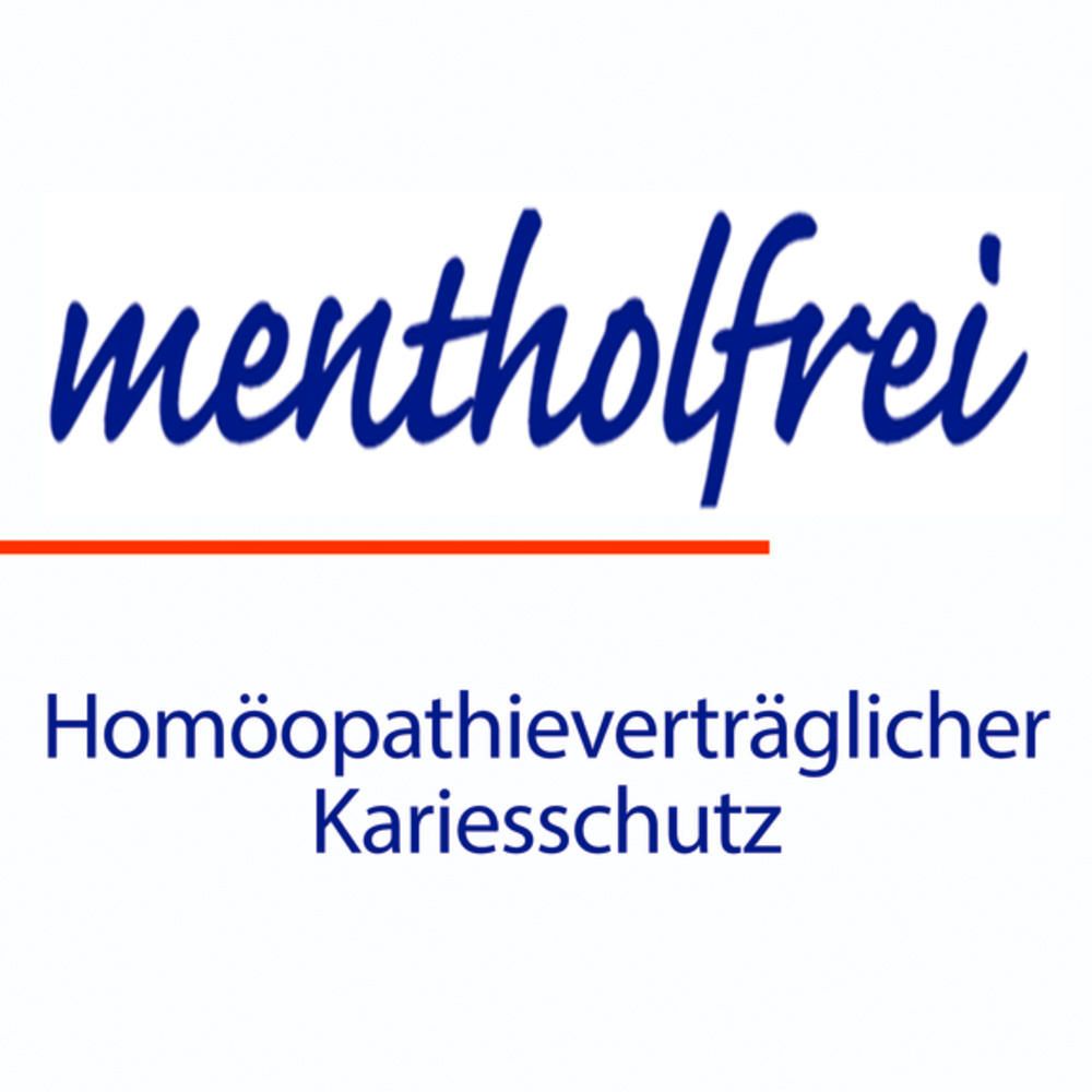 Texte : sans menthol, protection carie compatible homéopathie. Barre rouge.
