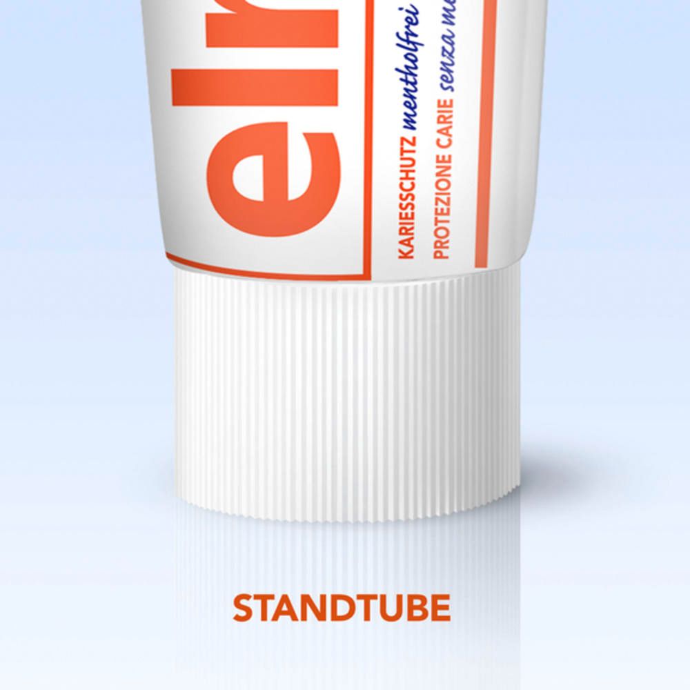 Gros plan sur le tube de dentifrice. Texte : Standtube. Col blanc du tube.