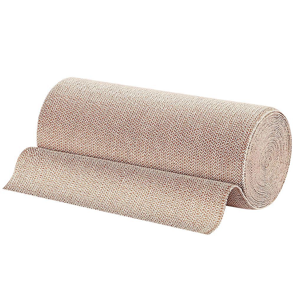 Bandage roulé, beige. La partie déployée montre la structure. Nom du produit non visible.