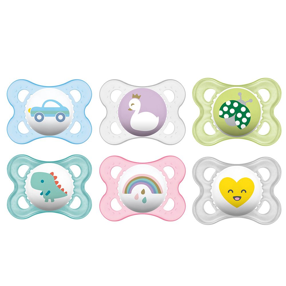 Six sucettes avec différents motifs : voiture, cygne, coccinelle, dinosaure, arc-en-ciel, cœur souriant.