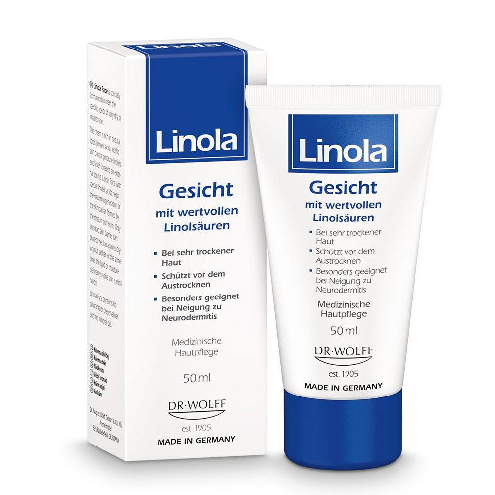 Linola Gesicht crème et emballage. Tube et boîte avec informations sur le produit. 50ml, DR. WOLFF.