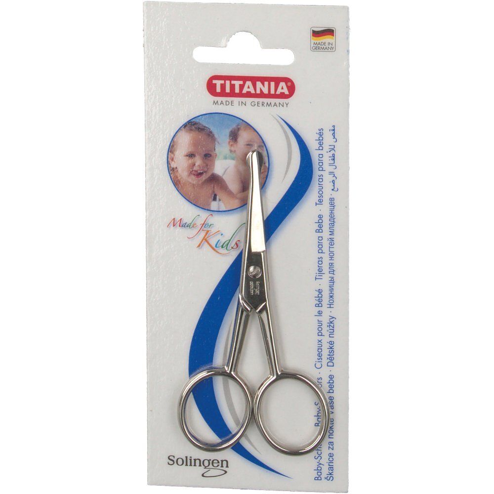 Ciseaux pour bébé TITANIA en blister. Ciseaux métalliques à bouts arrondis. Marque et pays d'origine sur l'emballage.