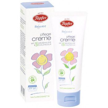 Tube et boîte blanches avec nom et logo du produit. Illustration d'une fleur. Label cosmétique naturel.