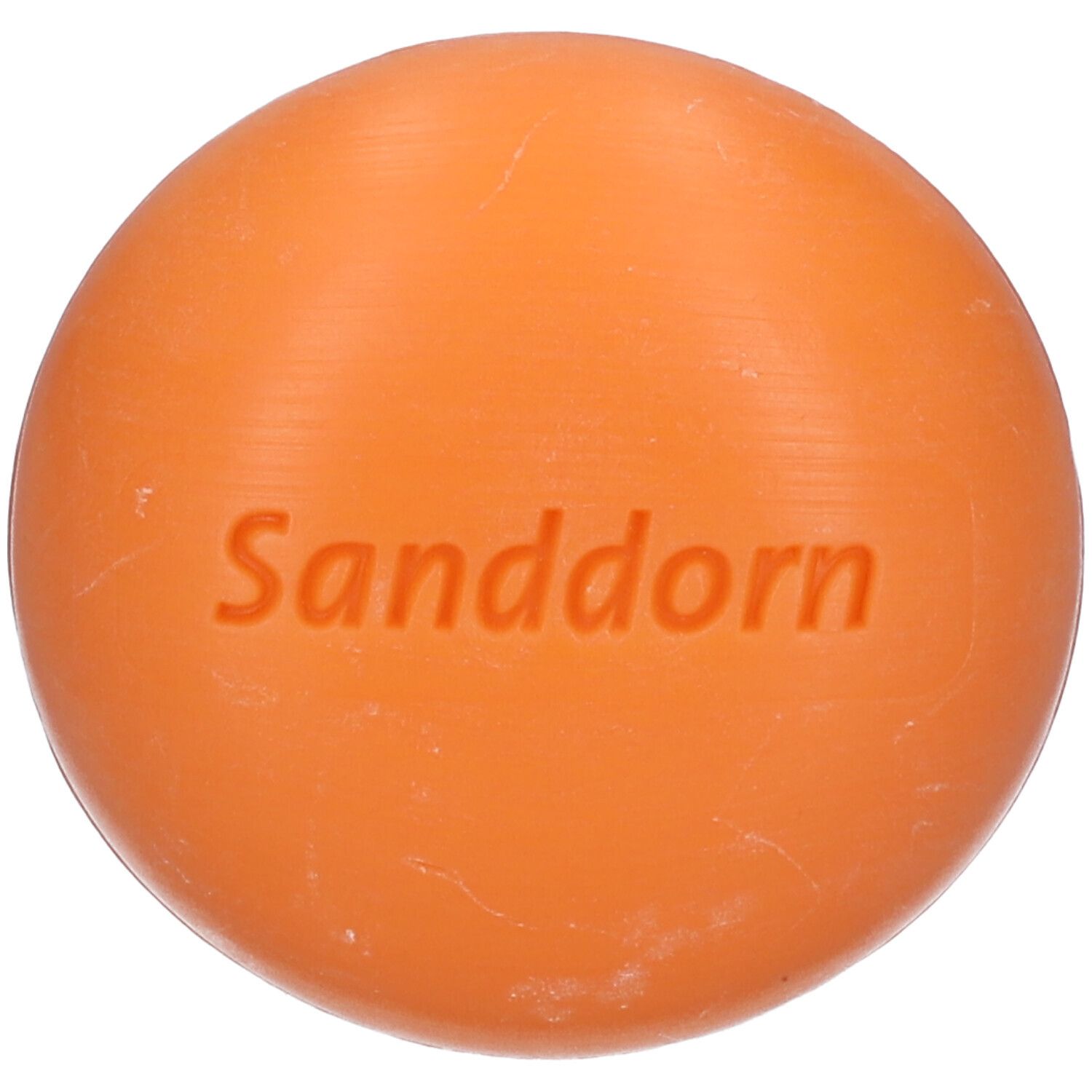 Savon orange avec inscription "Sanddorn". Forme ronde.