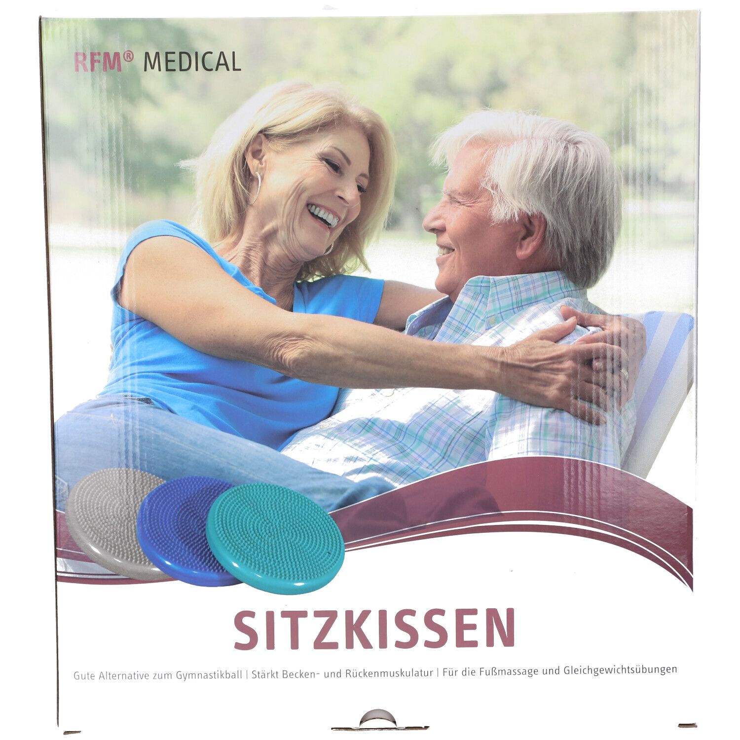 Sitzkissen RFM® bleu, trois coussins ronds gris, bleu et turquoise. Inscription : RFM MEDICAL, Sitzkissen. Emballage avec un couple âgé.