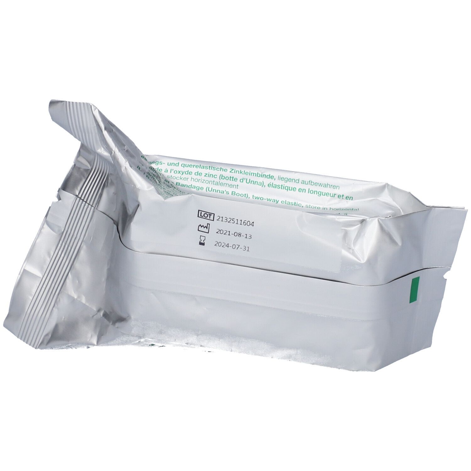 Emballage en sachet ouvert avec pansement à la pâte de zinc Varicex® S. Visible : pansement, date de péremption et numéro de lot.