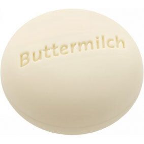 Savon rond, beige clair, avec inscription "Buttermilch".