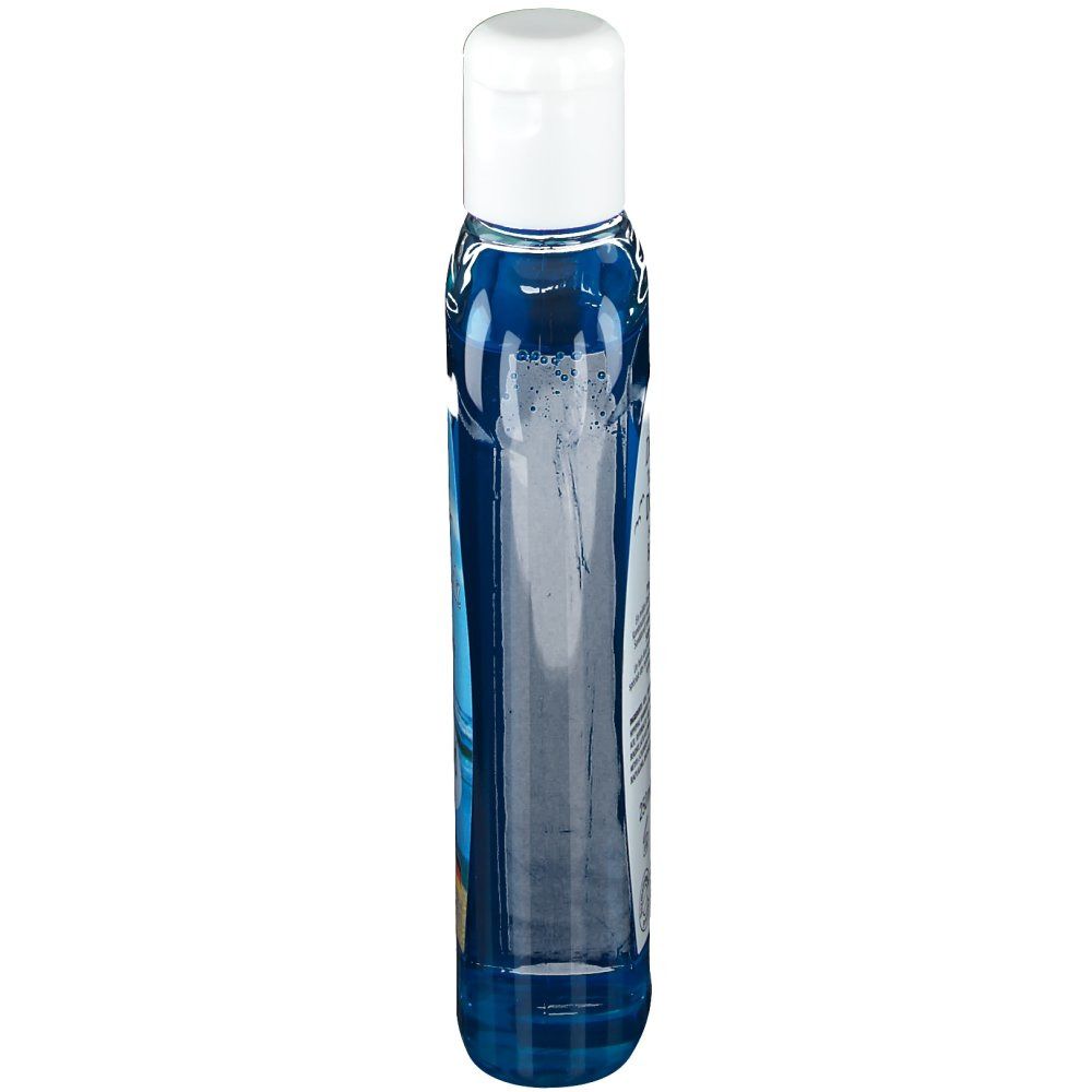 Flacon transparent étroit avec liquide bleu et bouchon blanc, vue latérale. Inscriptions partiellement visibles.