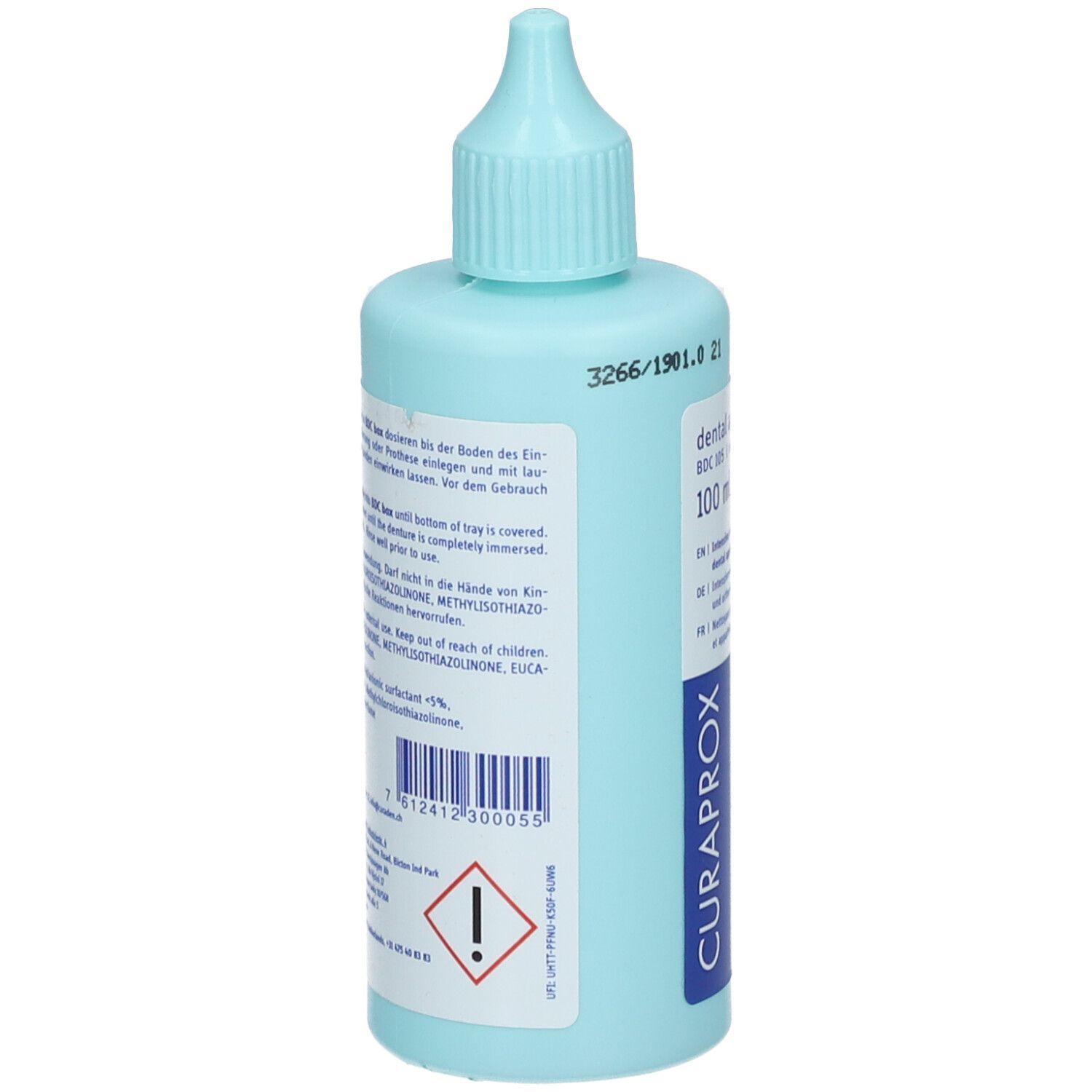 Flacon bleu clair avec bouchon doseur. Dos avec texte et avertissement. Logo CURAPROX.