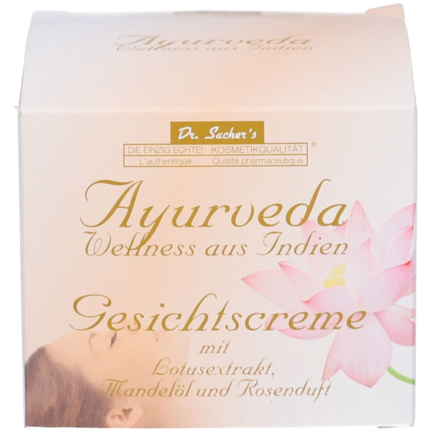 Emballage en carton. Impression: Dr. Sacher's Ayurveda Wellness aus Indien Crème pour le visage avec extrait de lotus, huile d'amande et parfum de rose.