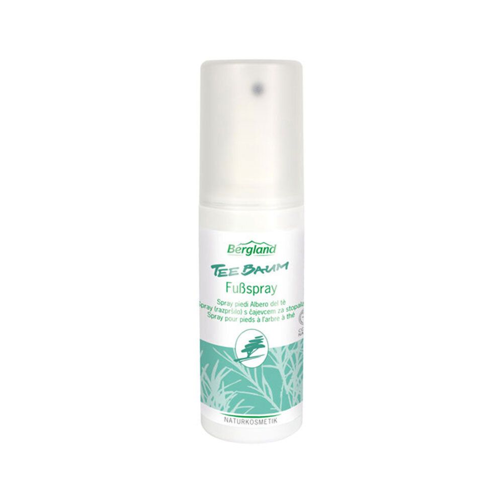 Flacon spray blanc avec bouchon transparent. Inscription : Bergland Tee Baum Fußspray. Logo cosmétique naturel.