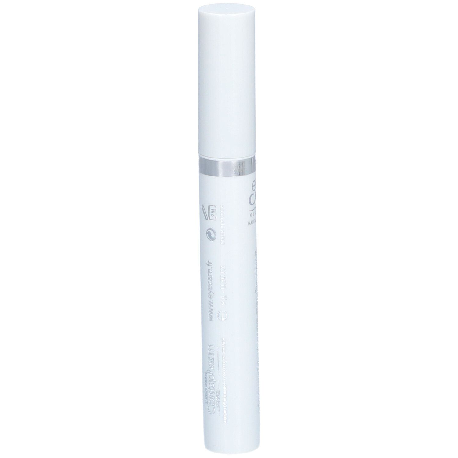 Tube de mascara blanc avec bague argentée et texte. Nom du produit: Eye Care. Inscription: Mascara Haute Tolérance.